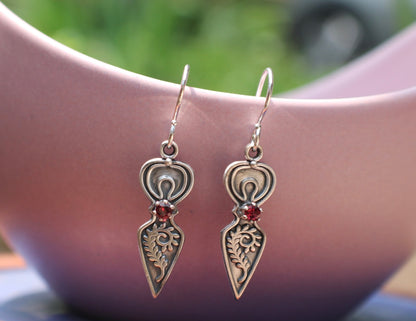 Goddess with garnet heart earrings